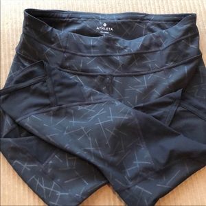 Athleta black wig & grey accents capris.